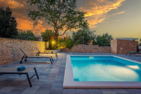 Apartments Cesare with Shared Pool